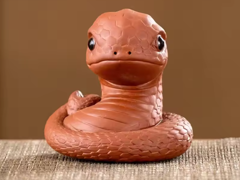 Snake figurine, clay, 6.5x7 cm