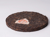 Sheng Pu Erh Żelazny Tea Cake (przepis Te Bing Т8633), fabryka Xiaguan, AA, 2007