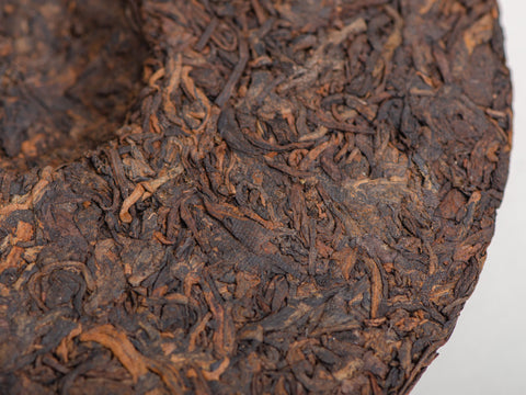 Shu Pu Erh Kun Que Shentai Gu Shu Bing (Caramel Peacock), 2012.