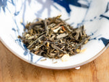 Moli Piao Xue Lu Cha (Jasmine green tea), 15 pieces of 2g each.